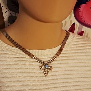 Elegant Gold, Blue and Diamond Necklace
